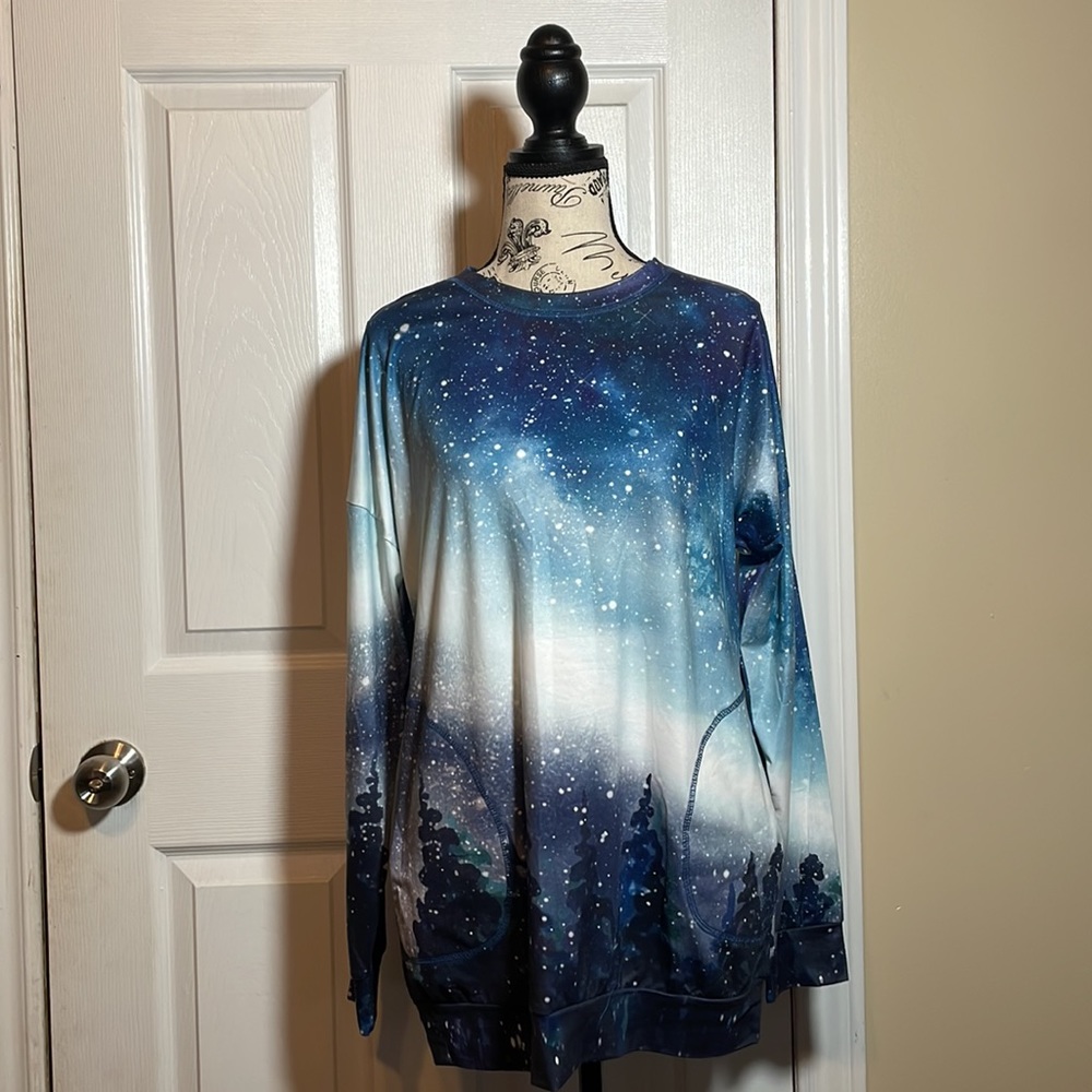 Beautiful long sleeve top with pockets.